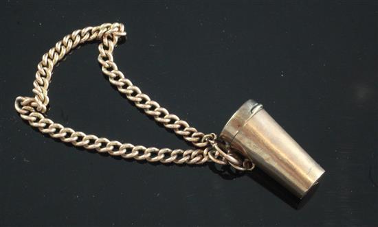 An early 20th century 9ct gold cased telescopic cigarette holder, on a 9ct gold chain, gross weight 23 grams.